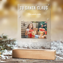 Carica l&#39;immagine nel visualizzatore di Gallery, Targa &quot;Santa Claus&quot; con base in legno a led e codice spotify 15cmx20cm personalizzabile
